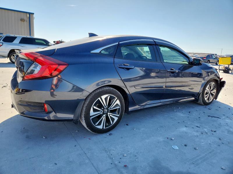 Photo 3 from auction – 2017 HONDA CIVIC EX with VIN 2HGFC1E33HH652677