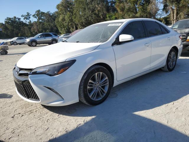 TOYOTA CAMRY LE 2015 with VIN 4T1BF1FKXFU486559 - Photo from auction