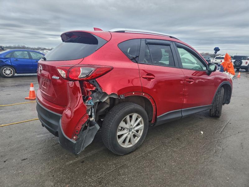 Photo 3 from auction – 2015 MAZDA CX-5 TOURI with VIN JM3KE2CY8F0545693