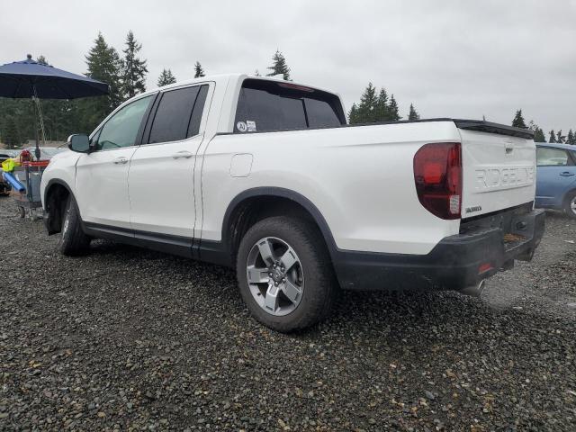 Photo 2 from auction – 2024 HONDA RIDGELINE with VIN 5FPYK3F59RB001722