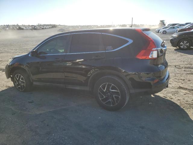 Photo 2 from auction – 2016 HONDA CR-V SE with VIN 2HKRM3H48GH525034
