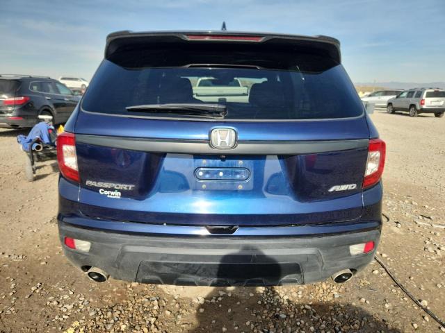Photo 6 from auction – 2021 HONDA PASSPORT E with VIN 5FNYF8H52MB026834