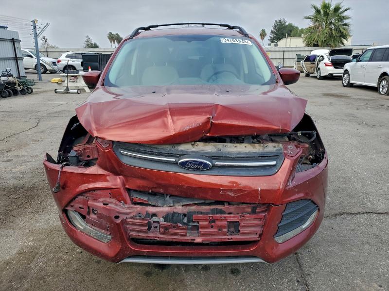 Photo 5 from auction – 2014 FORD ESCAPE SE with VIN 1FMCU9G97EUC92493