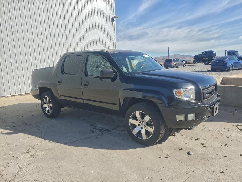 Photo 4 from auction – 2011 HONDA RIDGELINE with VIN 5FPYK1F52BB003810