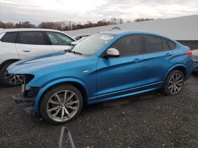BMW X4 XDRIVEM 2016 with VIN 5UXXW7C55G0M91073 - Photo from auction