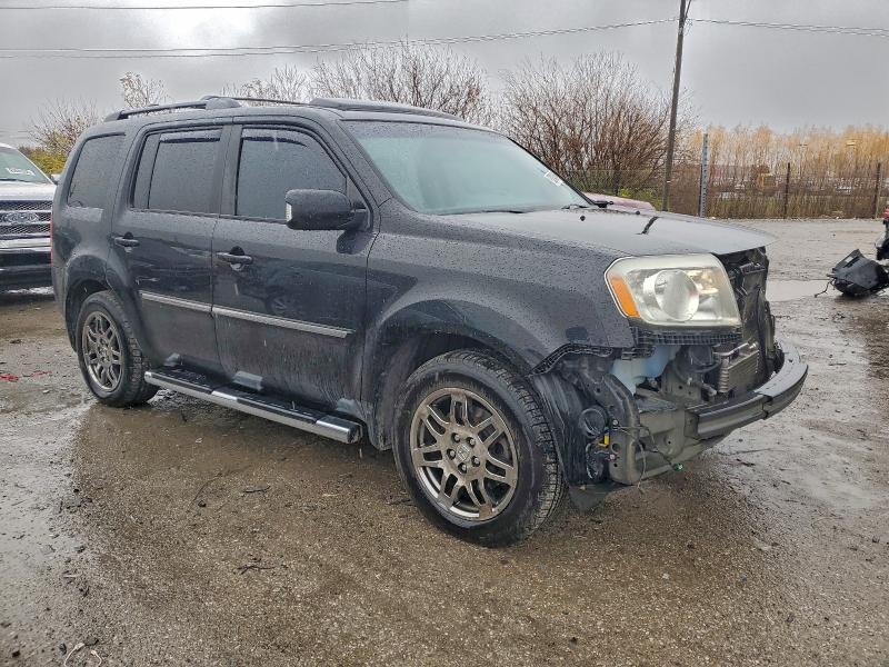 صورة رقم 4 من المزاد - 2011 HONDA PILOT TOUR مع VIN 5FNYF4H90BB047836