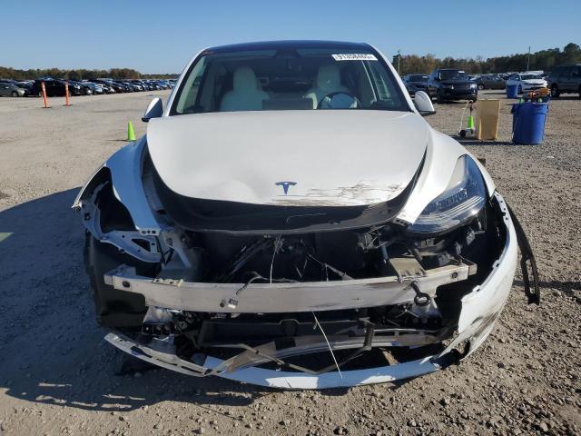 Photo 5 from auction – 2021 TESLA MODEL Y with VIN 5YJYGDED4MF115192