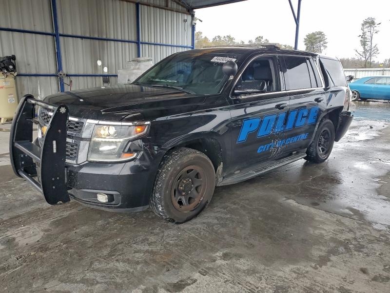 CHEVROLET TAHOE POLI 2015 with VIN 1GNLC2EC0FR674910 - Photo from auction