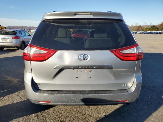 Photo 6 from auction – 2015 TOYOTA SIENNA LE with VIN 5TDJK3DC6FS110965