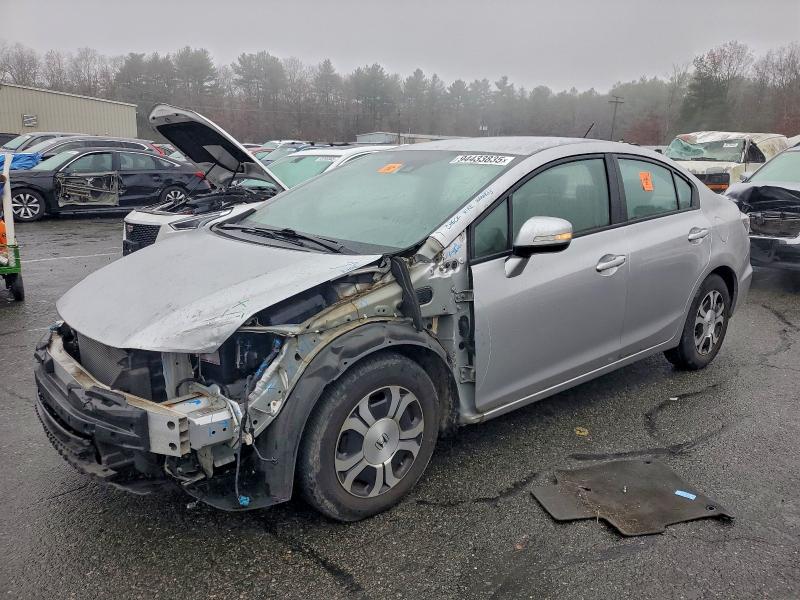 Photo 1 from auction – 2013 HONDA CIVIC HYBR with VIN 19XFB4F20DE202158
