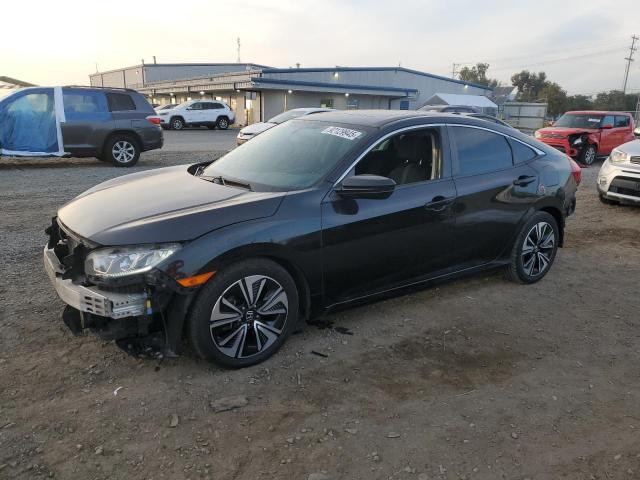 Photo 1 from auction – 2018 HONDA CIVIC EX with VIN JHMFC1F33JX016144