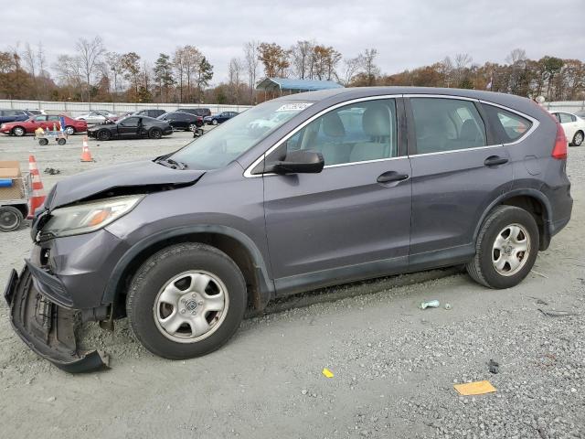 HONDA CR-V LX 2015 with VIN 3CZRM3H31FG702225 - Photo from auction