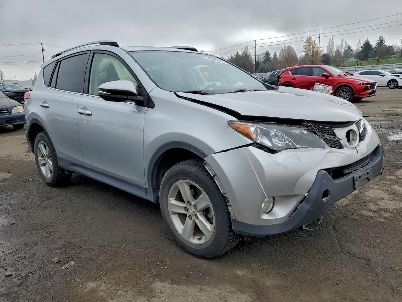 Photo 4 from auction – 2014 TOYOTA RAV4 XLE with VIN JTMRFREV9EJ004564