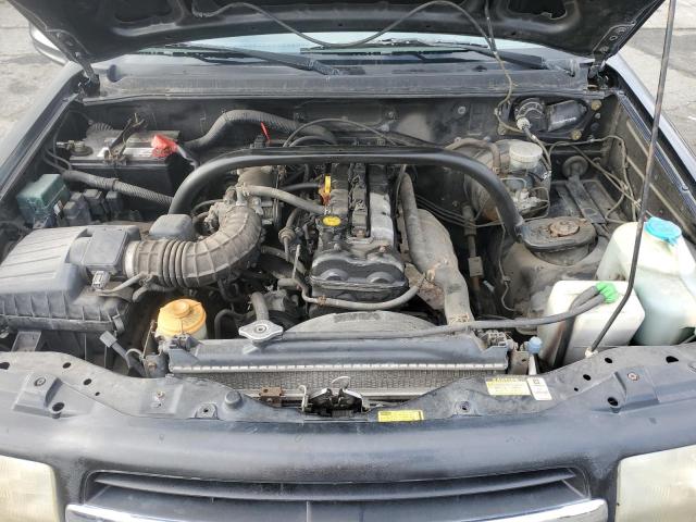 Фото 11 с аукциона – 1999 CHEVROLET TRACKER с VIN 2CNBJ13C5X6930927