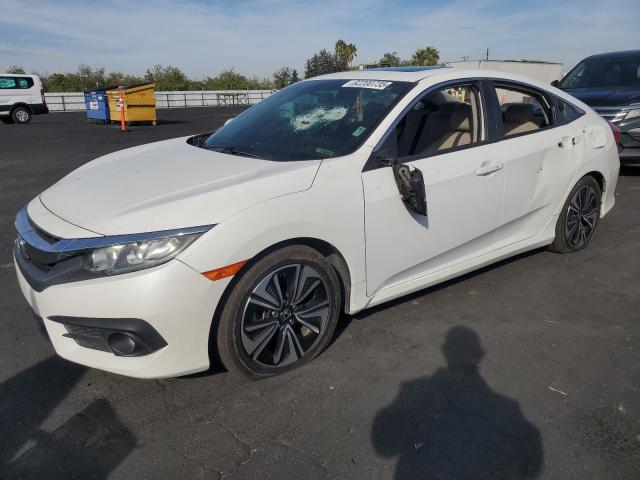HONDA CIVIC EX 2016 with VIN 2HGFC1F32GH632370 - Photo from auction