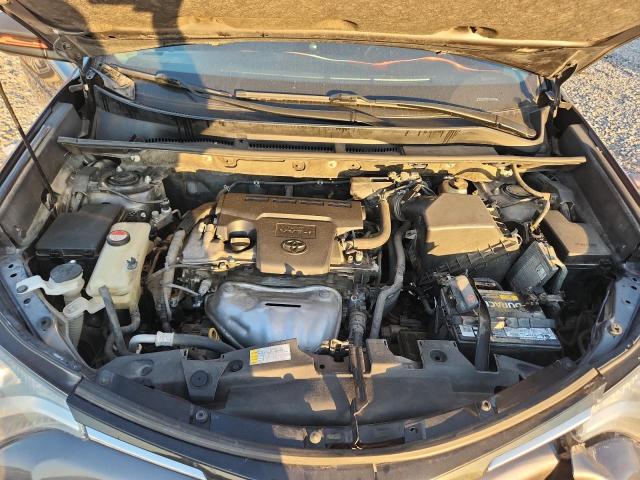 Photo 11 from auction – 2016 TOYOTA RAV4 LE with VIN JTMZFREV9GJ070308