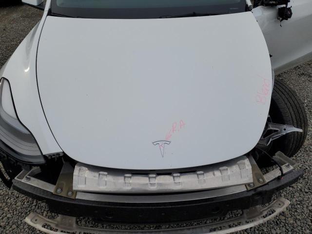 Photo 12 from auction – 2023 TESLA MODEL Y with VIN 7SAYGAEE6PF835172