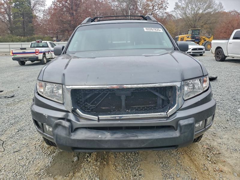 Photo 5 from auction – 2011 HONDA RIDGELINE with VIN 5FPYK1F50BB007502