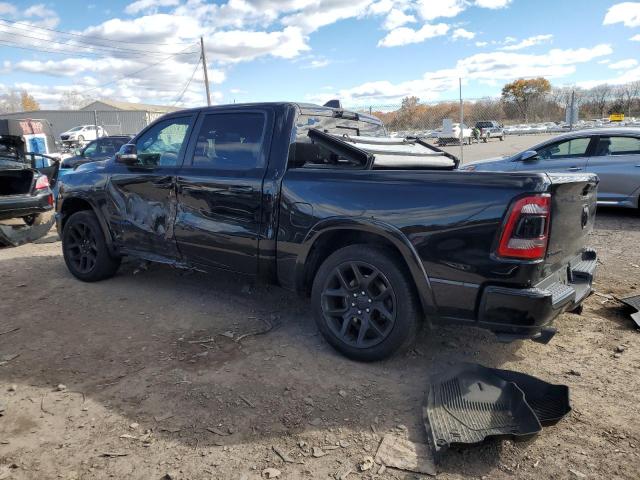 Photo 2 from auction – 2021 RAM 1500 LARAM with VIN 1C6SRFJT4MN624393