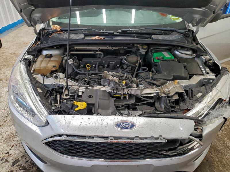 Photo 11 from auction – 2016 FORD FOCUS S with VIN 1FADP3E2XGL259747