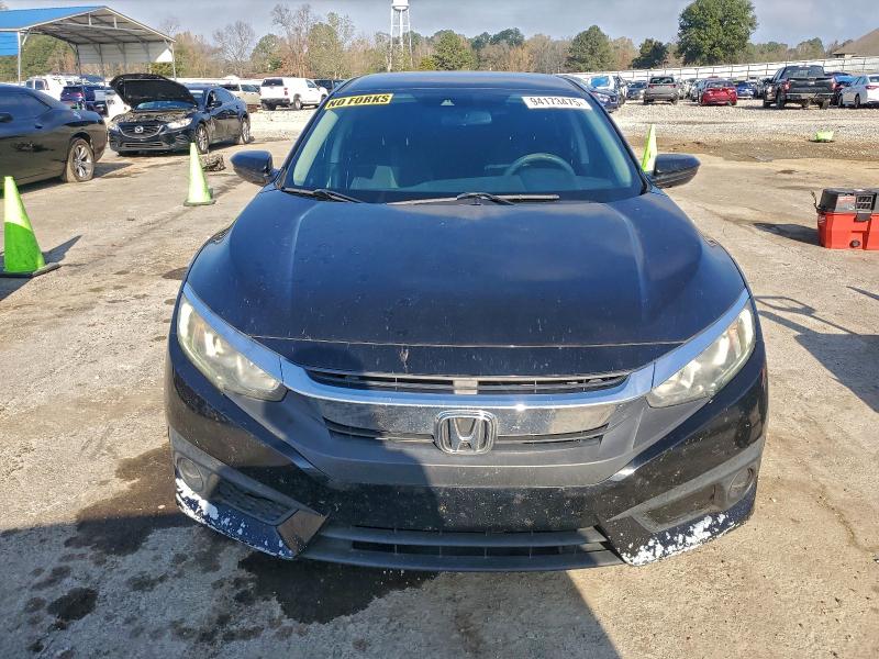 Photo 5 from auction – 2016 HONDA CIVIC LX with VIN 2HGFC2F61GH534804