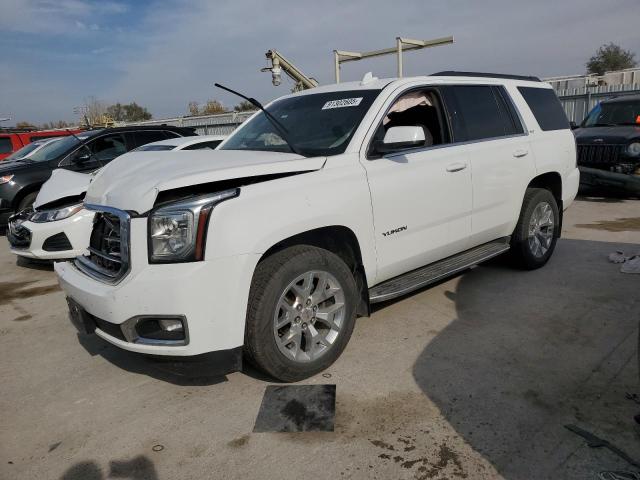 GMC YUKON SLT 2015 with VIN 1GKS2BKC5FR672411 - Photo from auction