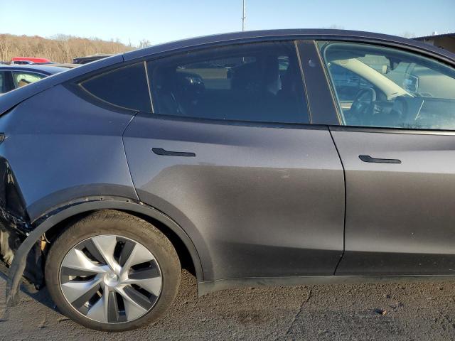 Photo 10 from auction – 2023 TESLA MODEL Y with VIN 7SAYGAEE6PF967994