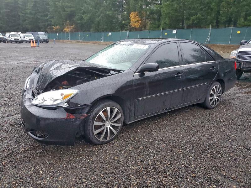TOYOTA CAMRY LE 2002 with VIN JTDBF30K020025820 - Photo from auction