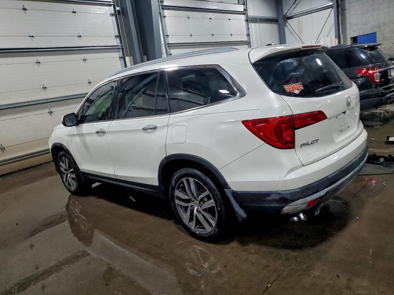 Photo 2 from auction – 2016 HONDA PILOT TOUR with VIN 5FNYF5H93GB021115