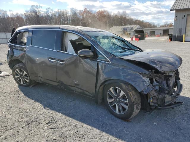 Photo 4 from auction – 2014 HONDA ODYSSEY TO with VIN 5FNRL5H99EB020593