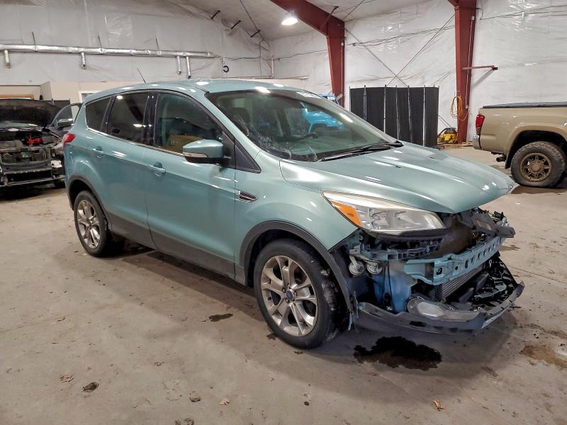 Photo 4 from auction – 2013 FORD ESCAPE with VIN 1FMCU9H95DUD46774