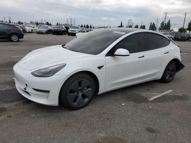 TESLA MODEL 3 2022 with VIN 5YJ3E1EAXNF153340 - Photo from auction