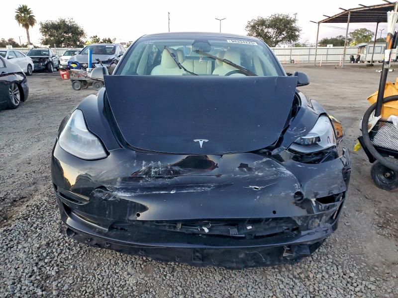 Photo 5 from auction – 2022 TESLA MODEL 3 with VIN 5YJ3E1EB7NF338065