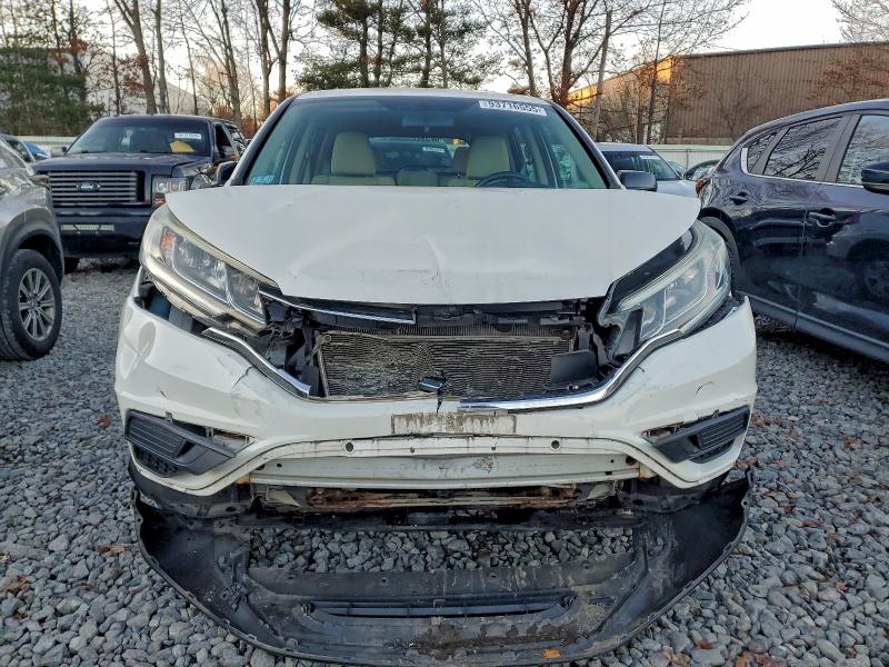 Photo 5 from auction – 2016 HONDA CR-V LX with VIN 5J6RM4H32GL105997