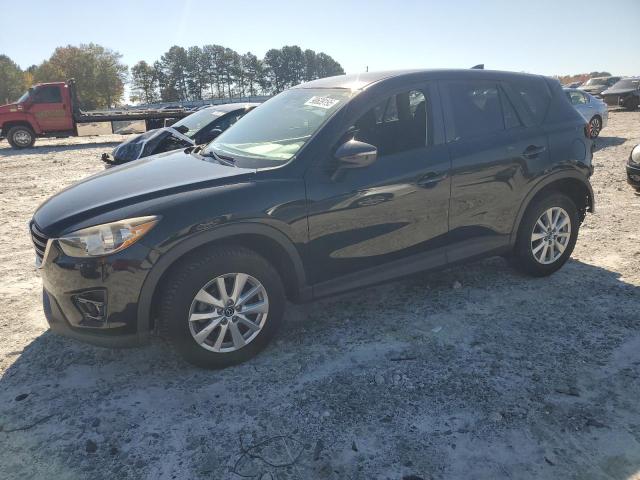 Photo 1 from auction – 2016 MAZDA CX-5 TOURI with VIN JM3KE4CY4G0636053