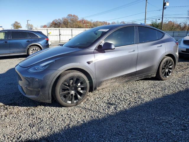TESLA MODEL Y 2022 with VIN 7SAYGAEE0NF508585 - Photo from auction