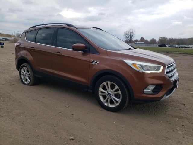 Photo 4 from auction – 2017 FORD ESCAPE SE with VIN 1FMCU9GD5HUC21656