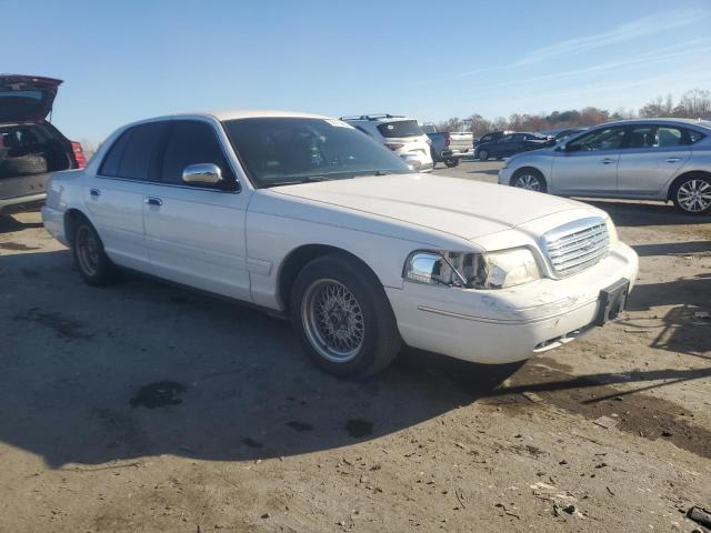 Photo 4 from auction – 2002 FORD CROWN VICT with VIN 2FAFP74W32X152216