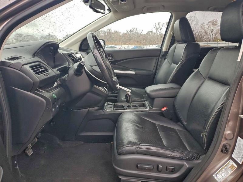 Photo 7 from auction – 2016 HONDA CR-V EXL with VIN 5J6RM4H79GL019279