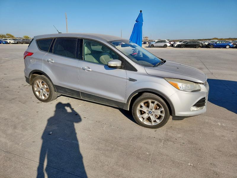 Photo 4 from auction – 2013 FORD ESCAPE with VIN 1FMCU9H92DUD03560