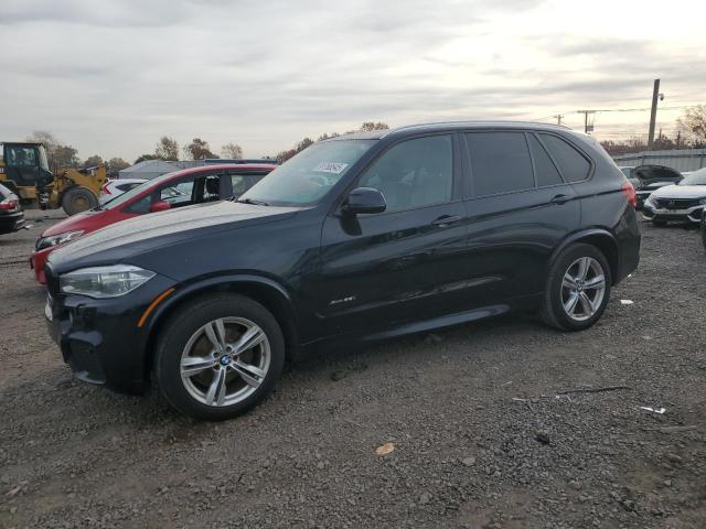 BMW X5 2014 with VIN 5UXKR0C54E0H19153 - Photo from auction
