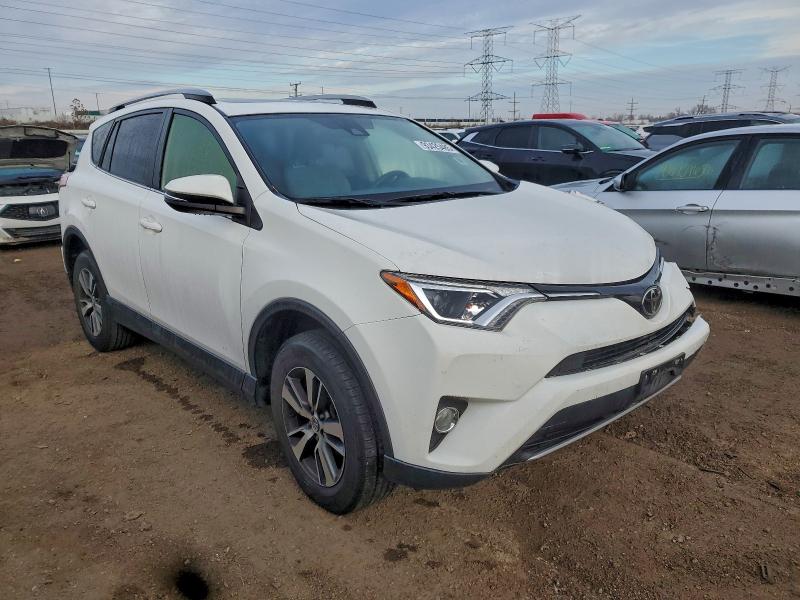 Photo 4 from auction – 2017 TOYOTA RAV4 with VIN JTMWFREV9HJ708917