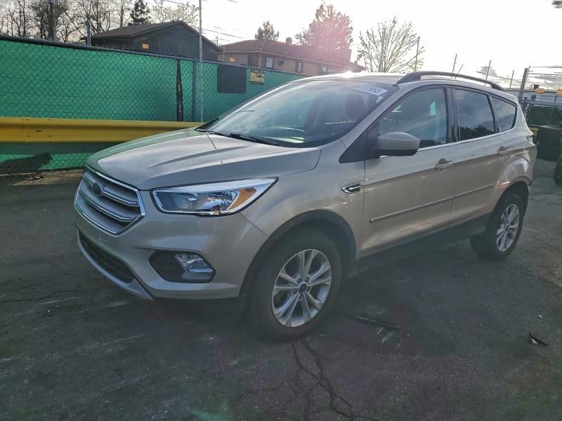FORD ESCAPE SE 2018 with VIN 1FMCU9GD4JUC33643 - Photo from auction