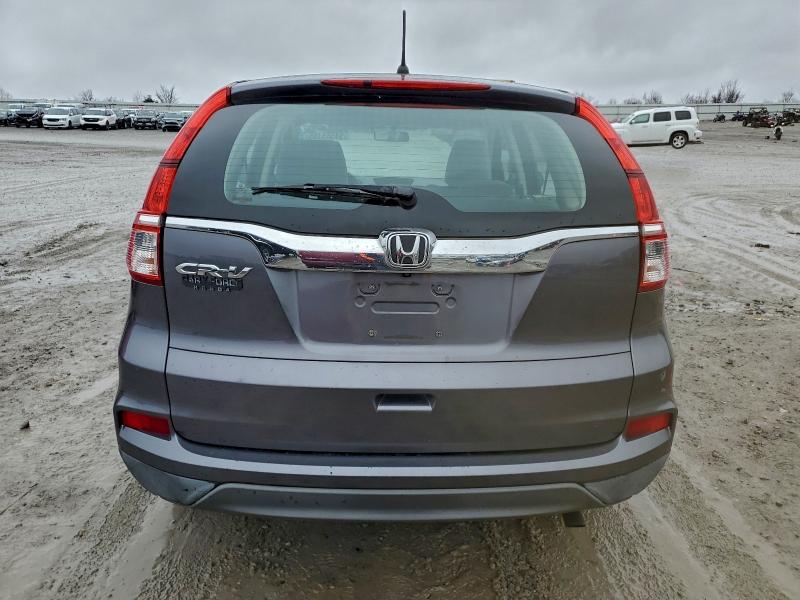 Photo 6 from auction – 2016 HONDA CR-V LX with VIN 2HKRM3H30GH504900