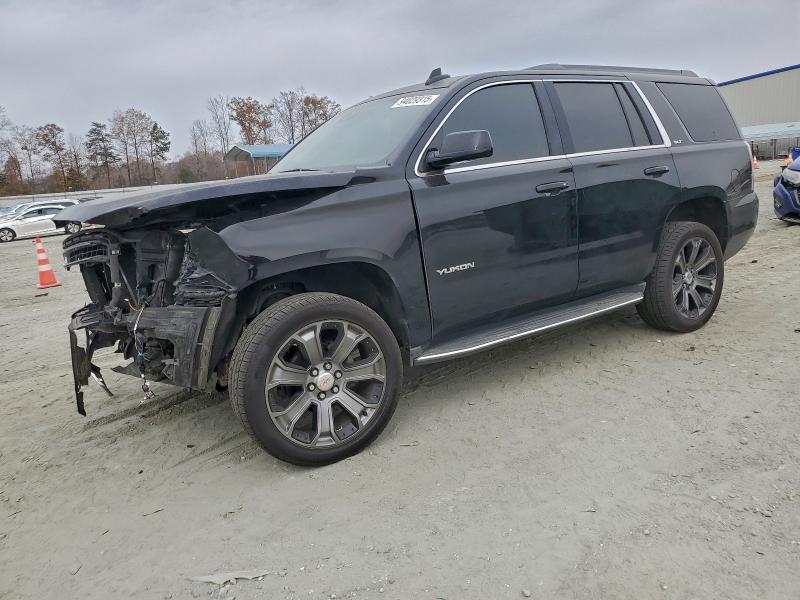 GMC YUKON SLT 2016 with VIN 1GKS1BKC9GR222068 - Photo from auction
