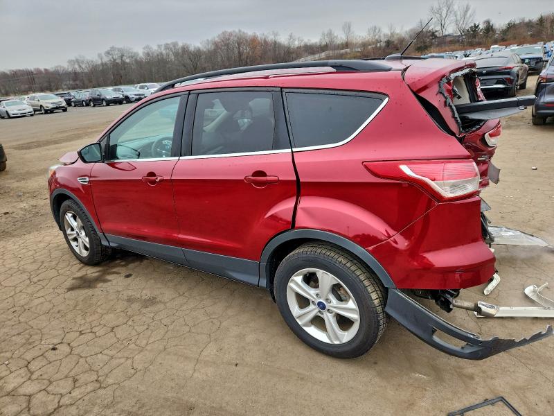 Photo 2 from auction – 2016 FORD ESCAPE SE with VIN 1FMCU9GX4GUB50605