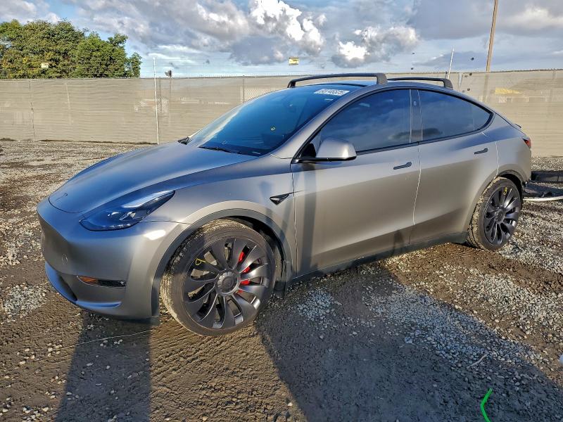 TESLA MODEL Y 2024 with VIN 7SAYGDEFXRF048884 - Photo from auction