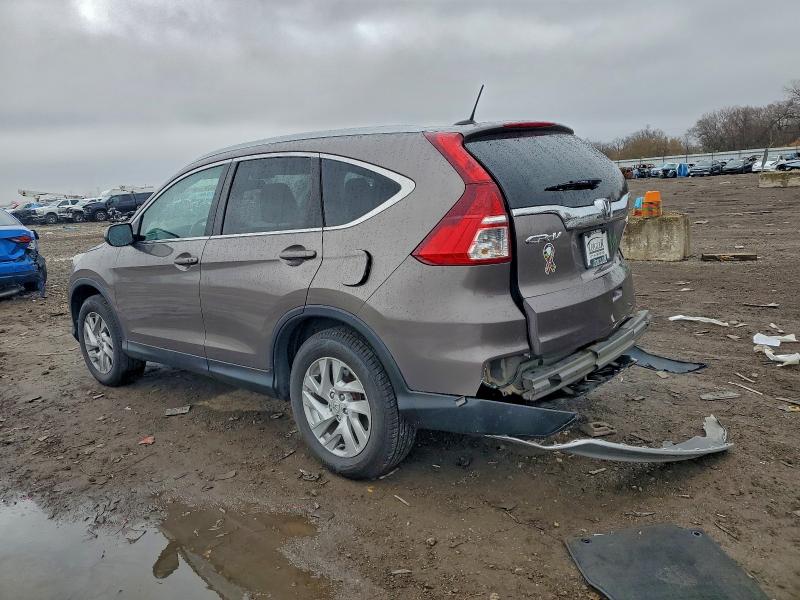 Photo 2 from auction – 2016 HONDA CR-V EXL with VIN 5J6RM4H79GL019279