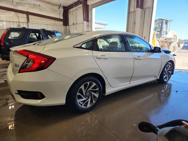 Photo 3 from auction – 2018 HONDA CIVIC EX with VIN 19XFC2F72JE012306