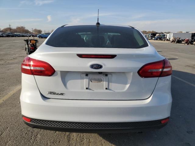 Photo 6 from auction – 2018 FORD FOCUS S with VIN 1FADP3E29JL269404